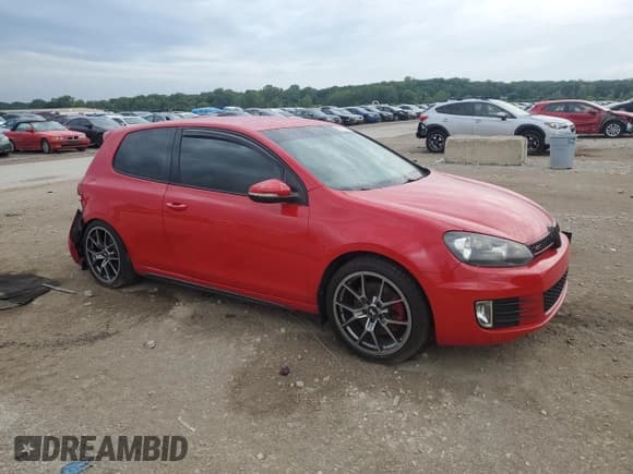 ✅ 2012 Volkswagen Golf GTI w/Conv & Sunroof • VIN: WVWEV7AJ7CW178142 • Lot: 61077795. Listed on Copart with 148,601 mi. Free auction sales archive from the USA and detailed vehicle history report at DreamBid. Image 4.