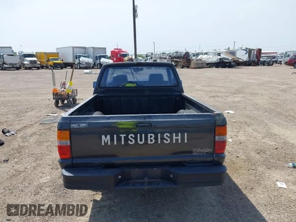 ✅ 1992 Mitsubishi Mighty Max • VIN: JA7FL24W9NP021503 • Lot: 41942559. Listed on IAAI with 162,088 mi. Free auction sales archive from the USA and detailed vehicle history report at DreamBid. Image 16.