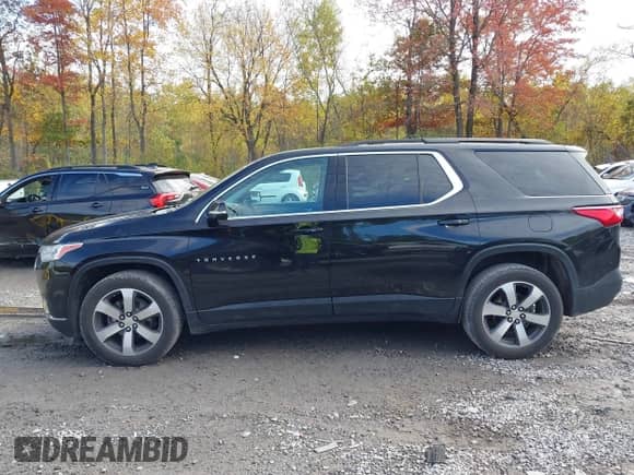2020 Chevrolet Traverse LT z VIN 1GNEVHKW3LJ106407, wystawiony jako IAAI lot #43463464 z przebiegiem 103 973 mil mil oraz . Historia ofert i sprzedaży dostępna na DreamBid. Obrazek 14.
