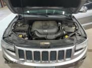 ✅ 2014 Jeep Grand Cherokee Overland • VIN: 1C4RJFCG2EC279277 • Lot: 87055085. Listed on Copart with 188,872 mi. Free auction sales archive from the USA and detailed vehicle history report at DreamBid. Image 12.