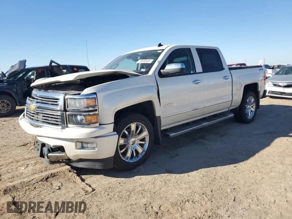✅ 2014 Chevrolet Silverado 1500 High Country • VIN: 3GCUKTEJ9EG534194 • Лот: 81630434. Опубликован ранее на Copart с пробегом 154 395 миль. Бесплатный доступ к архиву аукционных продаж из США и подробный отчёт об истории автомобиля на DreamBid. Изображение 1.
