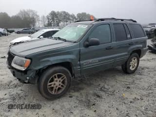✅ 2004 Jeep Grand Cherokee • VIN: 1J8GX48S24C186841 • Lot: 44897935. Listed on Copart with Not provided. Free auction sales archive from the USA and detailed vehicle history report at DreamBid. Image 1.