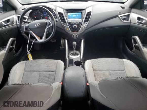 2013 Hyundai Veloster w/Gray Int с VIN KMHTC6AD3DU149988, выставлен на аукционе Copart как лот 72764624 с пробегом 30 503 миль миль и Списание • Salvage title. История ставок и продаж доступна на DreamBid. Изображение 8.