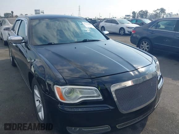 ✅ 2013 Chrysler 300 C • VIN: 2C3CCAET1DH574951 • Лот: 41379607. Опубликован ранее на IAAI с пробегом 185 530 миль. Бесплатный доступ к архиву аукционных продаж из США и подробный отчёт об истории автомобиля на DreamBid. Изображение 1.