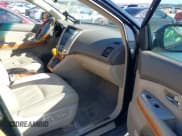 ✅ 2007 Lexus RX 350 • VIN: 2T2GK31U97C014602 • Lot: 41478452. Wystawiony na IAAI z przebiegiem 228 462 mil. Bezpłatny archiwum sprzedaży aukcyjnych z USA i szczegółowy raport historii pojazdu na DreamBid. Zdjęcie 5.