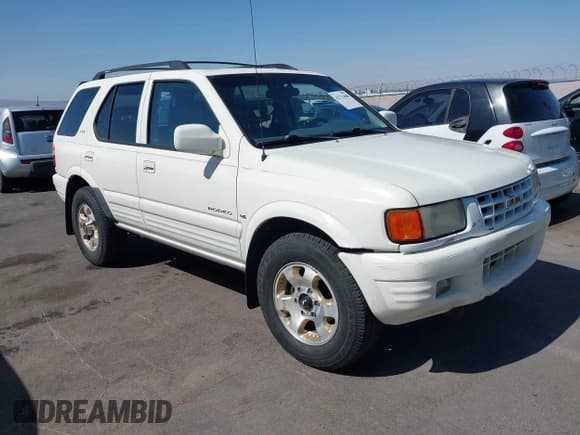 ✅ 1999 Isuzu Rodeo S • VIN: 4S2CK58W7X4325703 • Lot: 42715480. Listed on IAAI with 205,420 mi. Free auction sales archive from the USA and detailed vehicle history report at DreamBid. Image 6.