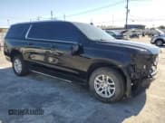 ✅ 2023 Chevrolet Suburban LT • VIN: 1GNSCCKD0PR100937 • Lot: 70415924. Wystawiony na Copart z przebiegiem 69 521 mil. Bezpłatny archiwum sprzedaży aukcyjnych z USA i szczegółowy raport historii pojazdu na DreamBid. Zdjęcie 4.