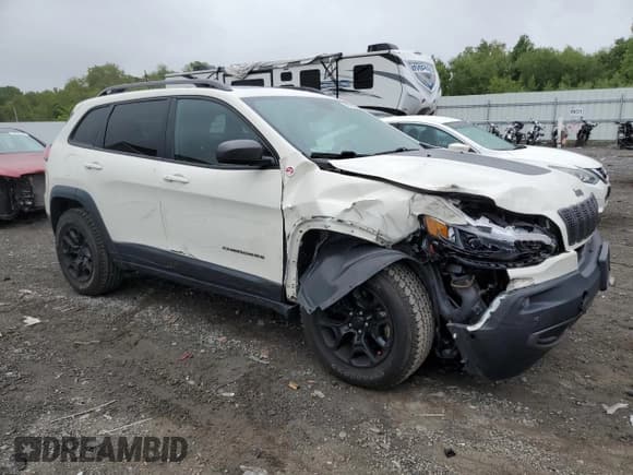 ✅ 2019 Jeep Cherokee Trailhawk • VIN: 1C4PJMBXXKD124205 • Lot: 58978505. Listed on Copart with 73,635 mi. Free auction sales archive from the USA and detailed vehicle history report at DreamBid. Image 4.