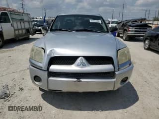 ✅ 2007 Mitsubishi Raider LS • VIN: 1Z7HC28KX7S126249 • Лот: 63955484. Опубликован ранее на Copart с пробегом 176 786 миль. Бесплатный доступ к архиву аукционных продаж из США и подробный отчёт об истории автомобиля на DreamBid. Изображение 5.