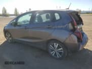 ✅ 2017 Honda Fit EX-L • VIN: 3HGGK5H82HM103057 • Лот: 86509645. Опубликован ранее на Copart с пробегом 101 528 миль. Бесплатный доступ к архиву аукционных продаж из США и подробный отчёт об истории автомобиля на DreamBid. Изображение 2.