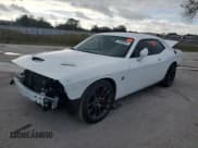 ✅ 2021 Dodge Challenger R/T Scat Pack • VIN: 2C3CDZFJ3MH663820 • Lot: 78598903. Wystawiony na Copart z przebiegiem 30 251 mil. Bezpłatny archiwum sprzedaży aukcyjnych z USA i szczegółowy raport historii pojazdu na DreamBid. Zdjęcie 1.