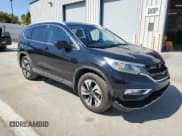 ✅ 2015 Honda CR-V Touring • VIN: 5J6RM3H95FL021816 • Лот: 81293285. Опубликован ранее на Copart с пробегом 137 194 миль. Бесплатный доступ к архиву аукционных продаж из США и подробный отчёт об истории автомобиля на DreamBid. Изображение 4.
