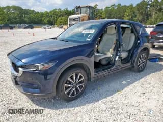 ✅ 2017 Mazda CX-5 Grand Touring • VIN: JM3KFBDL2H0129805 • Lot: 84409615. Listed on Copart with 56,359 mi. Free auction sales archive from the USA and detailed vehicle history report at DreamBid. Image 1.