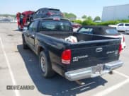 ✅ 2004 Dodge Dakota SLT • VIN: 1D7GL42N14S527342 • Lot: 42081956. Listed on IAAI with 165,157 mi. Free auction sales archive from the USA and detailed vehicle history report at DreamBid. Image 3.