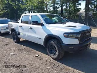 ✅ 2025 Ram 1500 Rebel • VIN: 1C6SRFLP2SN581797 • Лот: 43061676. Опубликован ранее на IAAI с пробегом 25 190 миль. Бесплатный доступ к архиву аукционных продаж из США и подробный отчёт об истории автомобиля на DreamBid. Изображение 1.