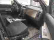 2010 Mercury Mariner with VIN 4M2CN9BG0AKJ06493, listed as a IAAI auction lot 41199173 with 143,631 mi miles and . Bid and sale history available at DreamBid. Image 5.