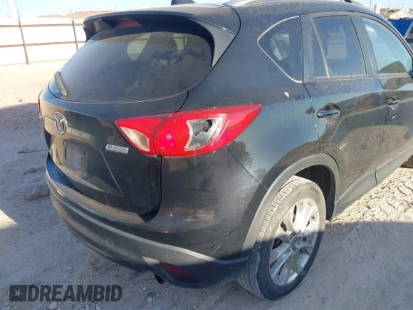 ✅ 2014 Mazda CX-5 Grand Touring • VIN: JM3KE2DY7E0345255 • Lot: 43668720. Listed on IAAI with 270,412 mi. Free auction sales archive from the USA and detailed vehicle history report at DreamBid. Image 6.