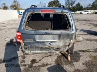 ✅ 2010 Ford Escape XLT • VIN: 1FMCU0DG2AKB07075 • Lot: 90613025. Wystawiony na Copart z przebiegiem 192 385 mil. Bezpłatny archiwum sprzedaży aukcyjnych z USA i szczegółowy raport historii pojazdu na DreamBid. Zdjęcie 6.