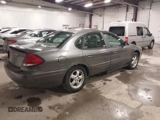 ✅ 2005 Ford Taurus SE • VIN: 1FAFP53205A294880 • Lot: 43792815. Wystawiony na IAAI z przebiegiem 168 375 mil. Bezpłatny archiwum sprzedaży aukcyjnych z USA i szczegółowy raport historii pojazdu na DreamBid. Zdjęcie 4.