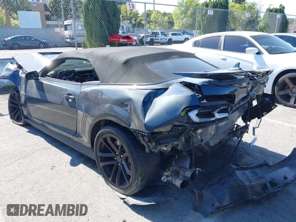 ✅ 2015 Chevrolet Camaro • VIN: 2G1FM3DP0F9800831 • Lot: 42216624. Listed on IAAI with 26,827 mi. Free auction sales archive from the USA and detailed vehicle history report at DreamBid. Image 3.