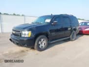 ✅ 2014 Chevrolet Tahoe LT • VIN: 1GNSCBE01ER235571 • Lot: 42403118. Listed on IAAI with 238,069 mi. Free auction sales archive from the USA and detailed vehicle history report at DreamBid. Image 18.