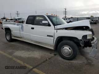 1997 Dodge 3500 with VIN 3B7MC33D2VM539216, listed as a Copart auction lot 64041205 with 373,264 mi miles and Salvage title. Bid and sale history available at DreamBid. Image 4.