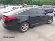 ✅ 2014 Kia Optima LX • VIN: 5XXGM4A75EG301889 • Lot: 42303398. Listed on IAAI with 165,819 mi. Free auction sales archive from the USA and detailed vehicle history report at DreamBid. Image 4.