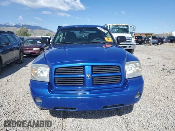 2007 Dodge Dakota SLT z VIN 1D7HW48N07S145519, wystawiony jako Copart lot #56992145 z przebiegiem Nie podano mil oraz Szkoda całkowita • Salvage title. Historia ofert i sprzedaży dostępna na DreamBid. Obrazek 5.