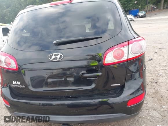 ✅ 2012 Hyundai Santa Fe GLS • VIN: 5XYZGDAG2CG144556 • Lot: 42596221. Listed on IAAI with 164,813 mi. Free auction sales archive from the USA and detailed vehicle history report at DreamBid. Image 16.