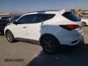 ✅ 2017 Hyundai Santa Fe 2.4L • VIN: 5NMZU3LB1HH017038 • Лот: 64975514. Опубликован ранее на Copart с пробегом 165 420 миль. Бесплатный доступ к архиву аукционных продаж из США и подробный отчёт об истории автомобиля на DreamBid. Изображение 2.