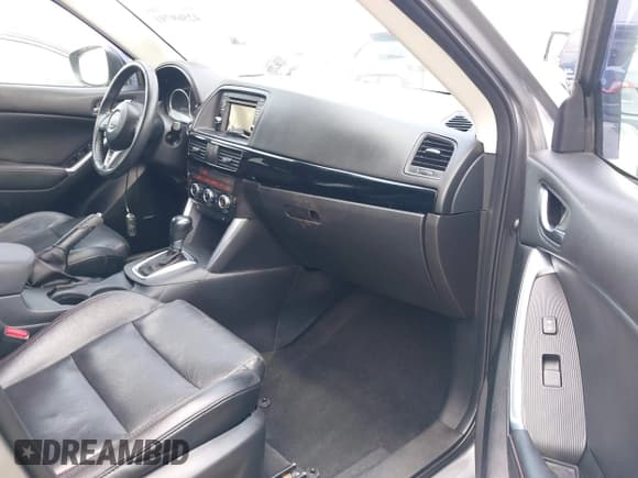 ✅ 2015 Mazda CX-5 Grand Touring • VIN: JM3KE2DY5F0552096 • Lot: 42569791. Listed on IAAI with 202,498 mi. Free auction sales archive from the USA and detailed vehicle history report at DreamBid. Image 5.