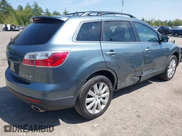 ✅ 2010 Mazda CX-9 Touring • VIN: JM3TB3MV4A0224881 • Lot: 42234860. Listed on IAAI with 176,938 mi. Free auction sales archive from the USA and detailed vehicle history report at DreamBid. Image 4.