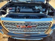 ✅ 2021 GMC Sierra 1500 Denali • VIN: 1GTU9FEL6MZ264449 • Лот: 86727545. Опубликован ранее на Copart с пробегом 77 804 миль. Бесплатный доступ к архиву аукционных продаж из США и подробный отчёт об истории автомобиля на DreamBid. Изображение 11.