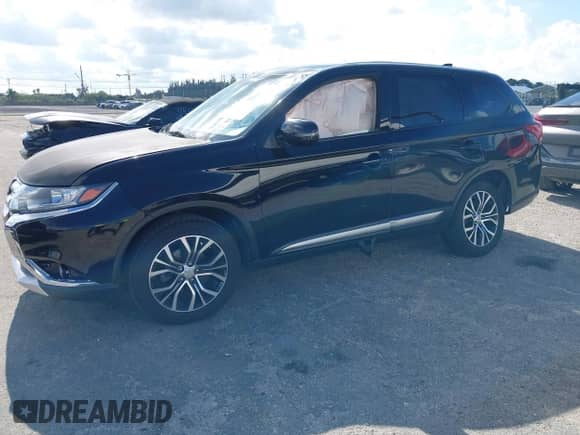 2018 Mitsubishi Outlander SE with VIN JA4AD3A33JZ055813, listed as a IAAI auction lot 41232885 with 126,457 mi miles and . Bid and sale history available at DreamBid. Image 2.
