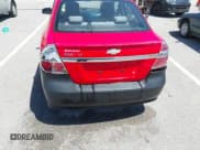 ✅ 2010 Chevrolet Aveo 1LT • VIN: KL1TD5DE0AB126585 • Lot: 42219460. Wystawiony na IAAI z przebiegiem 148 785 mil. Bezpłatny archiwum sprzedaży aukcyjnych z USA i szczegółowy raport historii pojazdu na DreamBid. Zdjęcie 6.