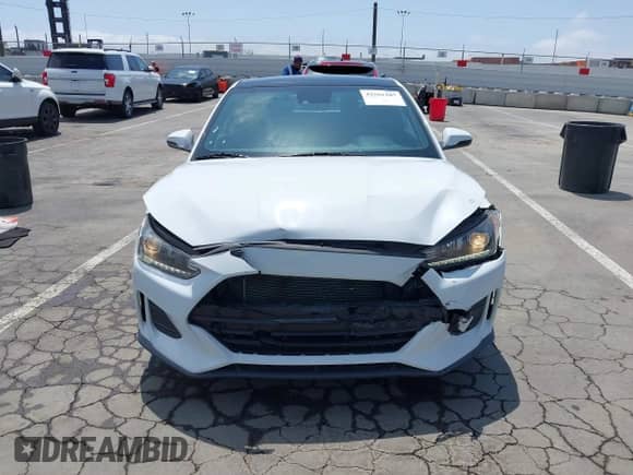 2019 Hyundai Veloster Premium z VIN KMHTG6AF9KU009835, wystawiony jako IAAI lot #42561187 z przebiegiem 42 763 mil mil oraz . Historia ofert i sprzedaży dostępna na DreamBid. Obrazek 12.