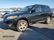 ✅ 2012 Hyundai Santa Fe Limited • VIN: 5XYZKDAG1CG159080 • Lot: 82495254. Listed on Copart with 174,813 mi. Free auction sales archive from the USA and detailed vehicle history report at DreamBid. Image 1.