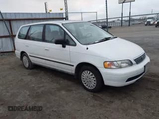 ✅ 1996 Honda Odyssey LX • VIN: JHMRA186XTC013939 • Lot: 43884417. Listed on IAAI with 149,057 mi. Free auction sales archive from the USA and detailed vehicle history report at DreamBid. Image 1.