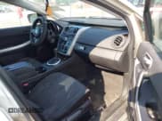 ✅ 2009 Mazda CX-7 Sport • VIN: JM3ER29L090216701 • Lot: 42928000. Wystawiony na IAAI z przebiegiem 203 564 mil. Bezpłatny archiwum sprzedaży aukcyjnych z USA i szczegółowy raport historii pojazdu na DreamBid. Zdjęcie 5.