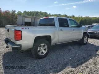 2017 Chevrolet Silverado 1500 LT с VIN 3GCUKREC7HG241595, выставлен на аукционе Copart как лот 69917625 с пробегом 128 393 миль миль и Списание • Salvage title. История ставок и продаж доступна на DreamBid. Изображение 3.