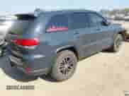 2017 Jeep Grand Cherokee Trailhawk with VIN 1C4RJFLG1HC790161, listed as a IAAI auction lot 43222197 with 142,785 mi miles and . Bid and sale history available at DreamBid. Image 4.