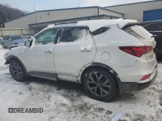 ✅ 2018 Hyundai Santa Fe Ultimate • VIN: 5XYZWDLAXJG519098 • Лот: 39298484. Опубликован ранее на Copart с пробегом 98 427 миль. Бесплатный доступ к архиву аукционных продаж из США и подробный отчёт об истории автомобиля на DreamBid. Изображение 2.