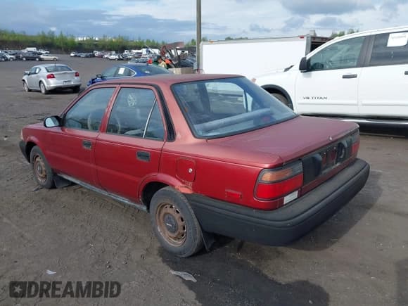 ✅ 1990 Toyota Corolla • VIN: JT2AE91AXL3318396 • Lot: 42186060. Listed on IAAI with 128,403 mi. Free auction sales archive from the USA and detailed vehicle history report at DreamBid. Image 3.