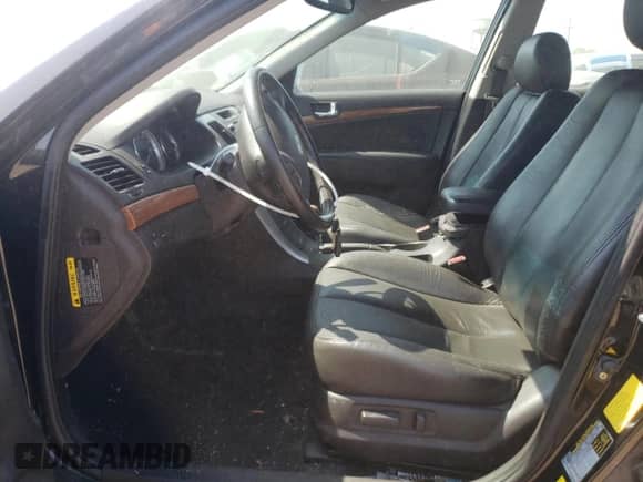 2009 Hyundai Sonata Limited z VIN 5NPEU46C59H524618, wystawiony jako Copart lot #64452144 z przebiegiem 142 226 mil mil oraz Szkoda całkowita • Salvage title. Historia ofert i sprzedaży dostępna na DreamBid. Obrazek 7.