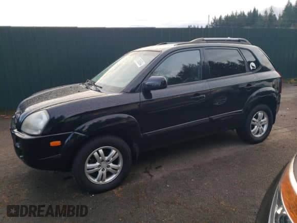 2007 Hyundai Tucson SE z VIN KM8JN72D97U671082, wystawiony jako Copart lot #81786064 z przebiegiem 122 431 mil mil oraz Szkoda całkowita • Salvage title. Historia ofert i sprzedaży dostępna na DreamBid. Obrazek 1.