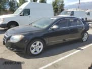✅ 2012 Chevrolet Malibu 1LS • VIN: 1G1ZB5E00CF209207 • Lot: 77158644. Listed on Copart with 107,161 mi. Free auction sales archive from the USA and detailed vehicle history report at DreamBid. Image 1.
