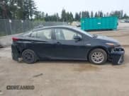 ✅ 2021 Toyota Prius LE • VIN: JTDKAMFP0M3179016 • Lot: 42204095. Listed on IAAI with 34,691 mi. Free auction sales archive from the USA and detailed vehicle history report at DreamBid. Image 14.