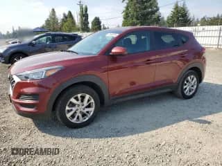2019 Hyundai Tucson SE z VIN KM8J2CA44KU915961, wystawiony jako Copart lot #70549075 z przebiegiem 135 210 mil mil oraz Czysty tytuł • Clean title. Historia ofert i sprzedaży dostępna na DreamBid. Obrazek 1.
