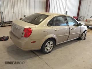 ✅ 2006 Suzuki Forenza Premium • VIN: KL5JJ56Z26K312943 • Lot: 42719194. Wystawiony na IAAI z przebiegiem 157 121 mil. Bezpłatny archiwum sprzedaży aukcyjnych z USA i szczegółowy raport historii pojazdu na DreamBid. Zdjęcie 4.