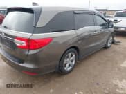 ✅ 2020 Honda Odyssey EX • VIN: 5FNRL6H50LB055717 • Lot: 42205465. Listed on IAAI with 104,719 mi. Free auction sales archive from the USA and detailed vehicle history report at DreamBid. Image 4.